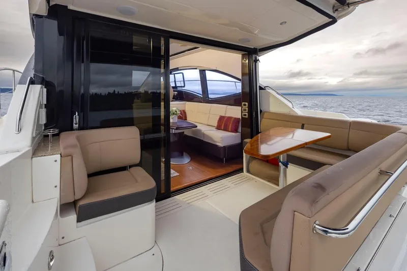 You Betcha Yacht Photos Pics Luxurious 2016 Sea Ray 400 Sundancer yacht interior with seating and ocean view.