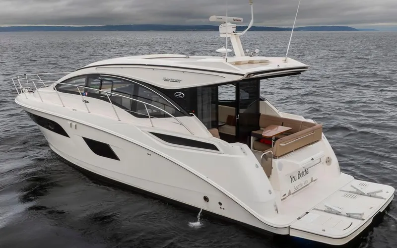 You Betcha Yacht Photos Pics 2016 Sea Ray 400 Sundancer yacht cruising on open water.