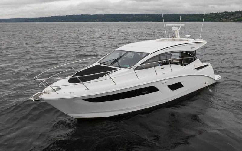 You Betcha Yacht Photos Pics 2016 Sea Ray 400 Sundancer yacht cruising on open water.