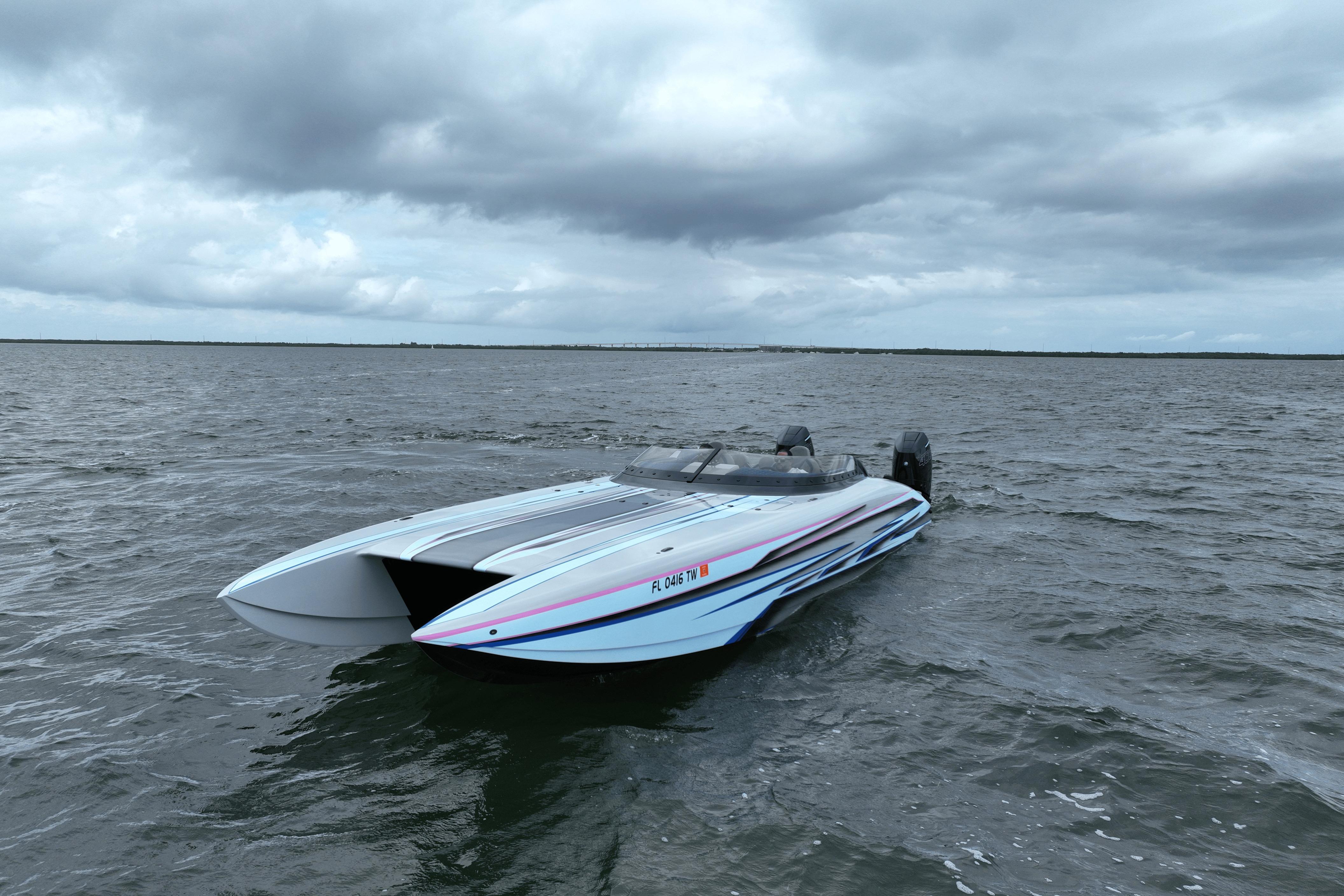 2024 Dug Wright 32 speedboat on open water under cloudy skies.