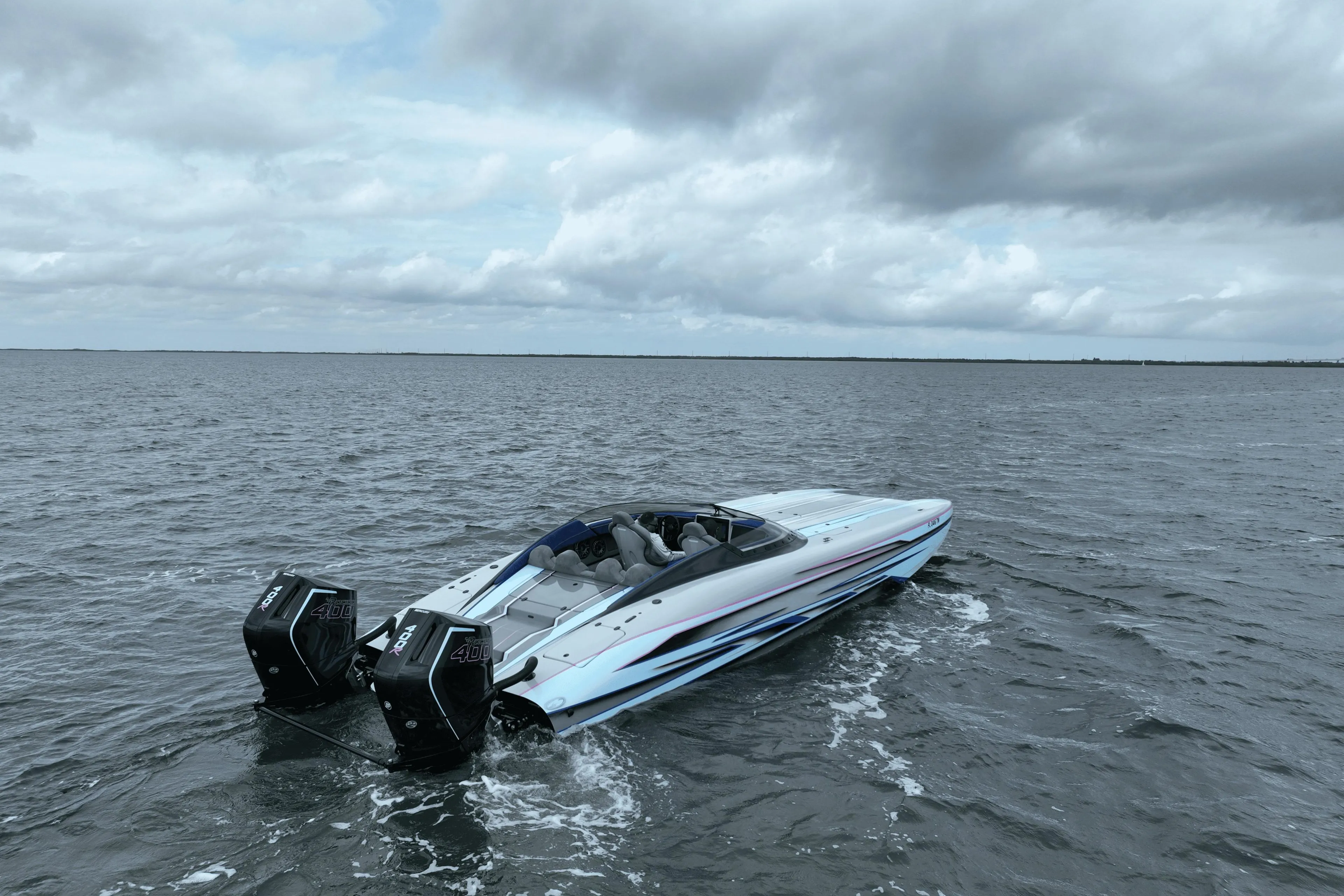2024 Dug Wright 32 speedboat cruising on open water under cloudy skies.