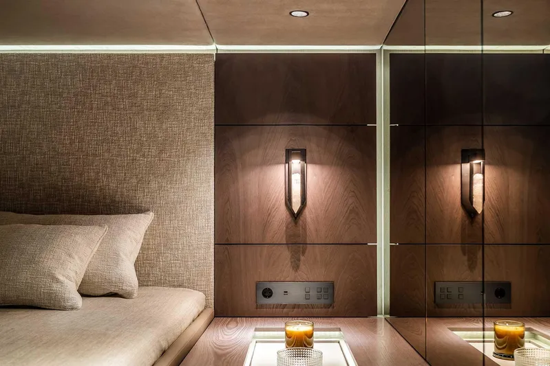  Yacht Photos Pics Luxurious interior of 2026 Sunreef 60 Sunreef Power yacht with elegant lighting and cozy seating.