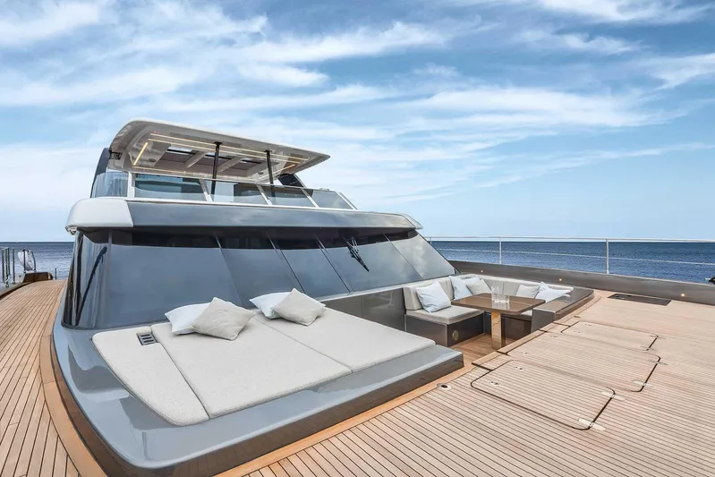  Yacht Photos Pics Luxurious 2026 Sunreef 60 Power yacht with spacious deck and elegant seating area.