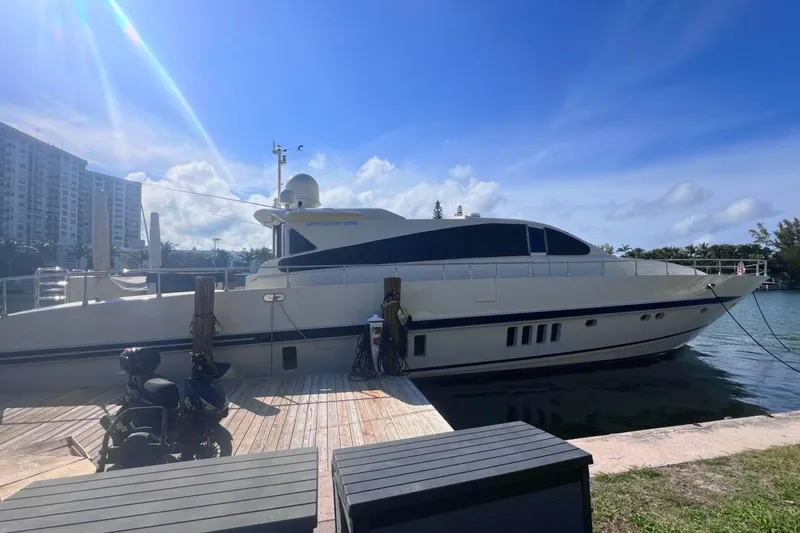  Yacht Photos Pics Luxury Leopard 27m yacht docked under clear blue sky, 2005 model.
