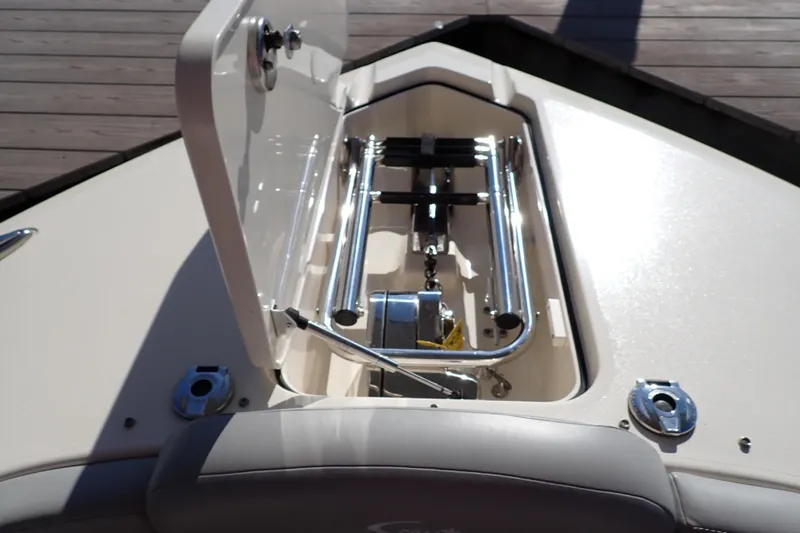  Yacht Photos Pics Open anchor compartment on 2021 Scout 277 Dorado boat, showcasing stainless steel hardware.