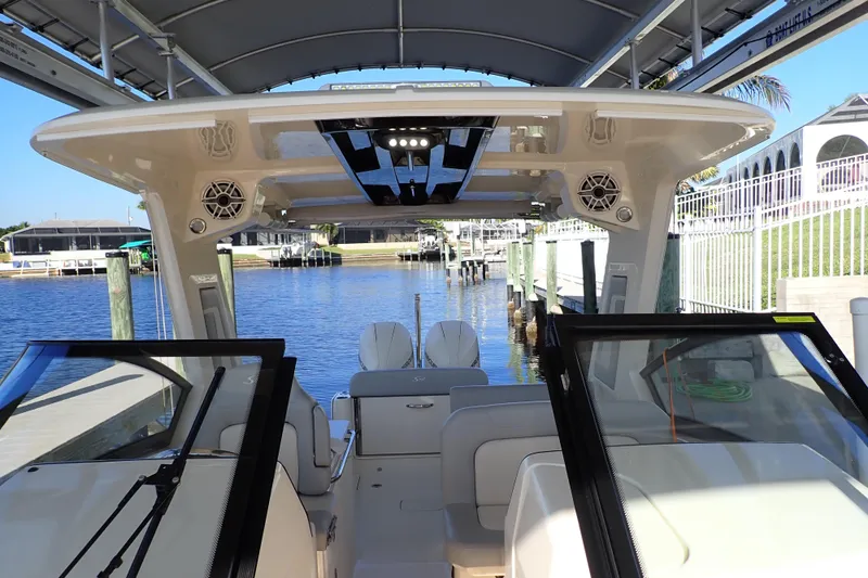  Yacht Photos Pics 2021 Scout 277 Dorado boat interior with seating and water view.