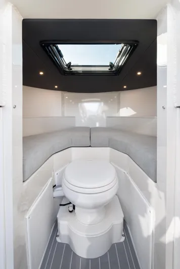 Jasper Marine Defender 22 Yacht Photos Pics Interior of 2025 Jasper Marine Defender 22 boat with toilet and skylight.