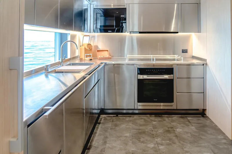  Yacht Photos Pics Modern stainless steel kitchen in 2025 Majesty 100 Terrace yacht.