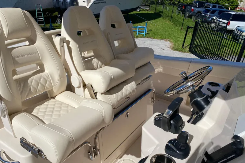  Yacht Photos Pics Luxurious seating and helm of 2026 Grady-White Canyon 336 boat.