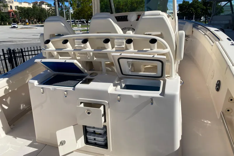  Yacht Photos Pics 2026 Grady-White Canyon 336 boat interior with fishing rod holders and storage compartments.