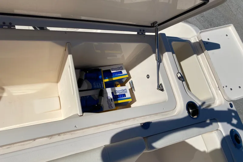  Yacht Photos Pics Storage compartment on 2026 Grady-White Canyon 336 boat with HoseCoil products.