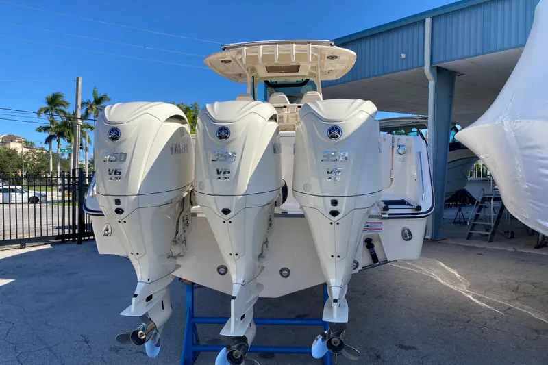  Yacht Photos Pics 2026 Grady-White Canyon 336 boat with triple Yamaha V6 outboard engines.