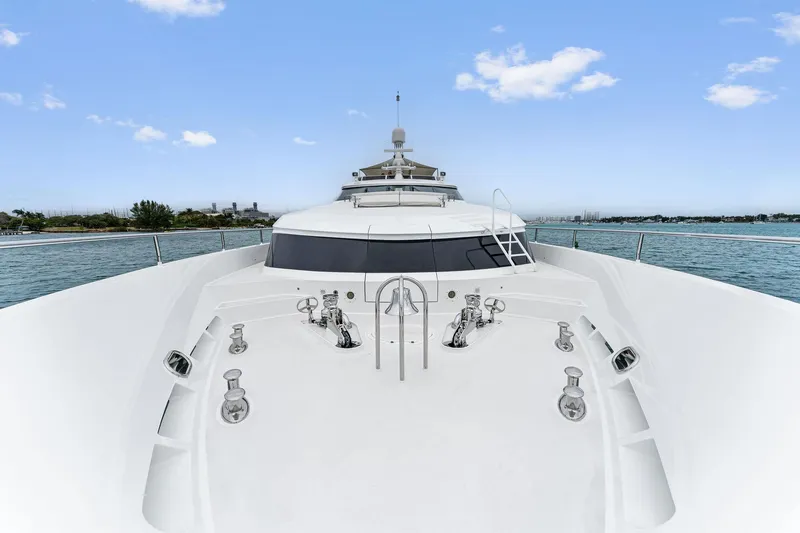 Invictus Yacht Photos Pics Palmer Johnson 2006 motor yacht deck with ocean view and clear sky.