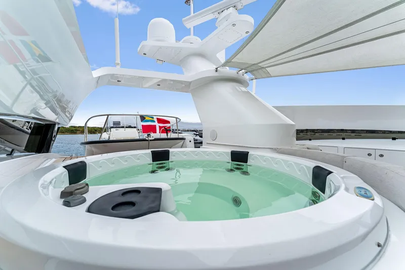 Invictus Yacht Photos Pics Luxurious 2006 Palmer Johnson motor yacht with a jacuzzi on deck.