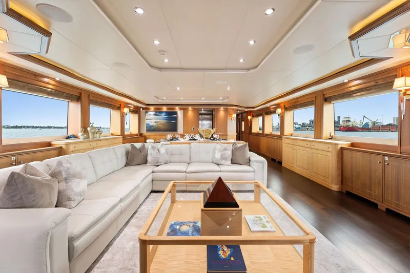 Invictus Yacht Photos Pics Luxurious 2006 Palmer Johnson motor yacht interior with elegant seating and panoramic windows.
