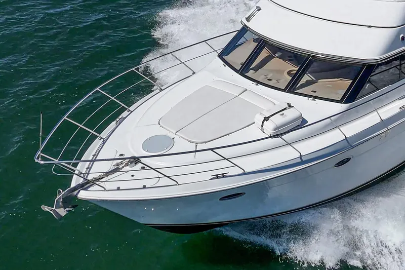 Kathy's Dream Yacht Photos Pics 2000 Carver 450 Voyager Pilothouse cruising on open water.