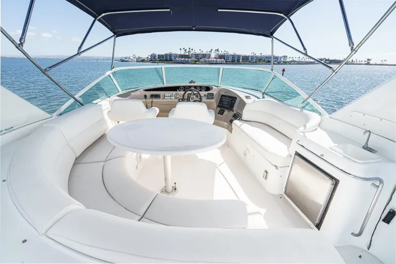 Kathy's Dream Yacht Photos Pics 2000 Carver 450 Voyager Pilothouse yacht interior with seating and ocean view.