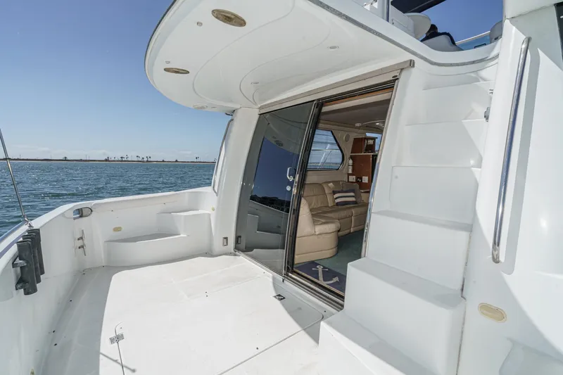 Kathy's Dream Yacht Photos Pics 2000 Carver 450 Voyager Pilothouse yacht with open deck and luxurious interior view.