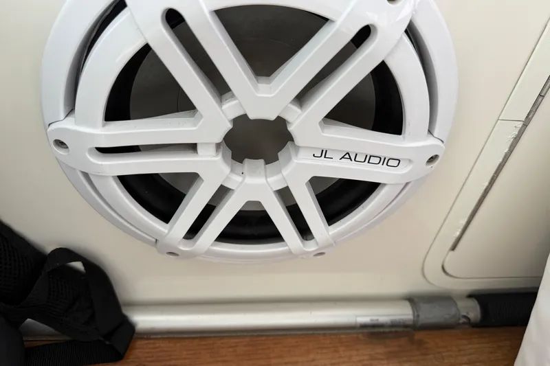 Turn The Page Yacht Photos Pics White JL Audio speaker on 2006 Sea Ray 48 Sundancer boat interior.