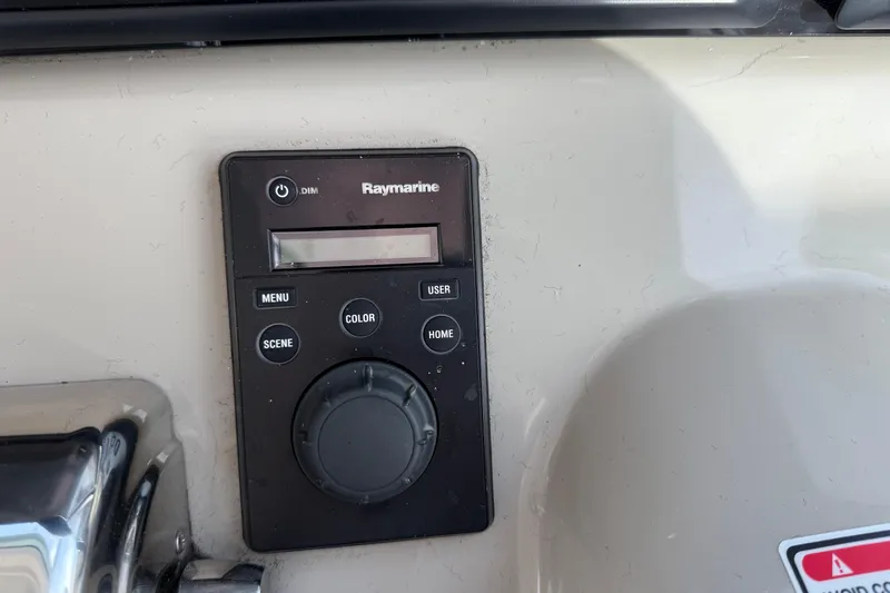 Turn The Page Yacht Photos Pics Raymarine control panel on 2006 Sea Ray 48 Sundancer yacht dashboard.