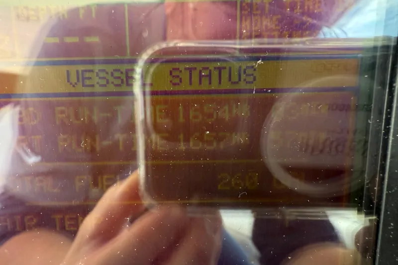 Turn The Page Yacht Photos Pics Display screen showing vessel status on a 2006 Sea Ray 48 Sundancer yacht.