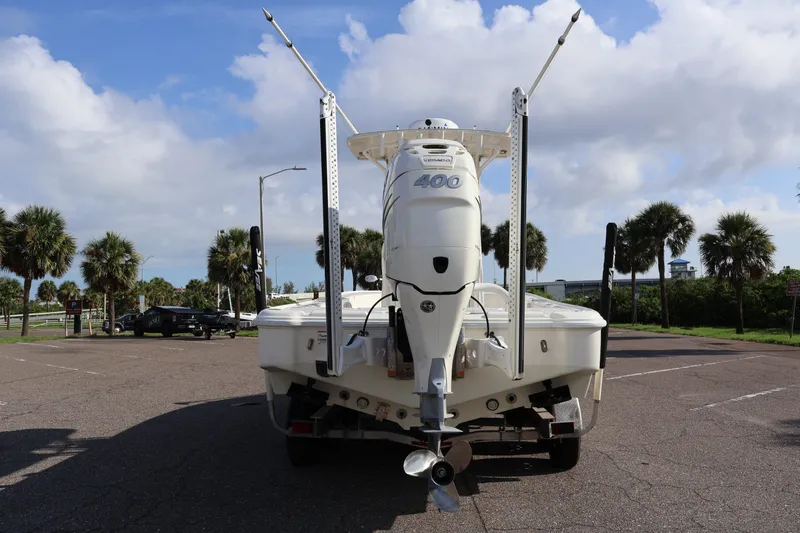  Yacht Photos Pics 2019 SeaVee 270Z boat with powerful outboard motor, parked on a sunny day.