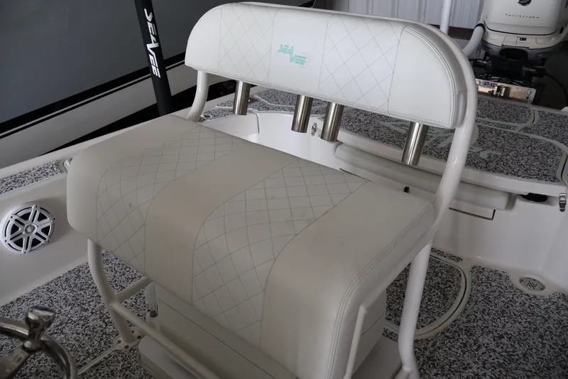  Yacht Photos Pics 2019 SeaVee 270Z boat interior with cushioned seating and rod holders.