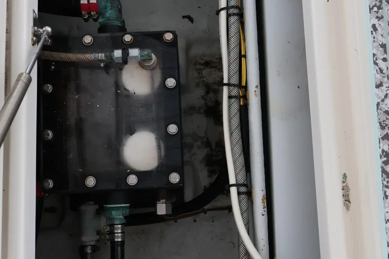  Yacht Photos Pics 2019 SeaVee 270Z boat compartment with visible wiring and plumbing components.