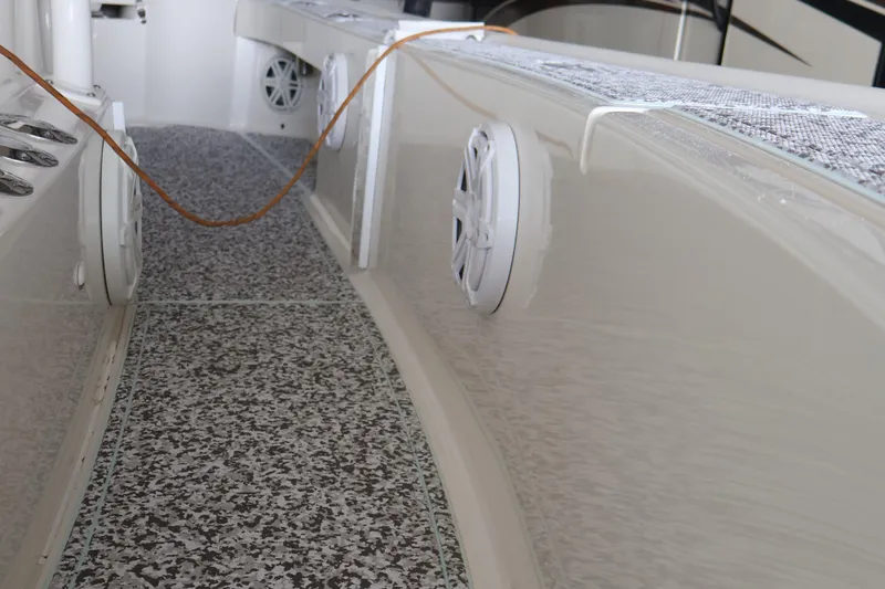  Yacht Photos Pics 2019 SeaVee 270Z boat interior with speakers and textured flooring.