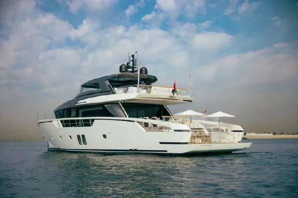  Yacht Photos Pics Sanlorenzo SX88 2022 yacht on calm water under a partly cloudy sky.