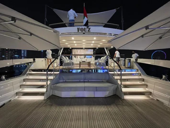  Yacht Photos Pics Luxurious 2022 Sanlorenzo SX88 yacht at night, featuring elegant deck lighting and modern design.