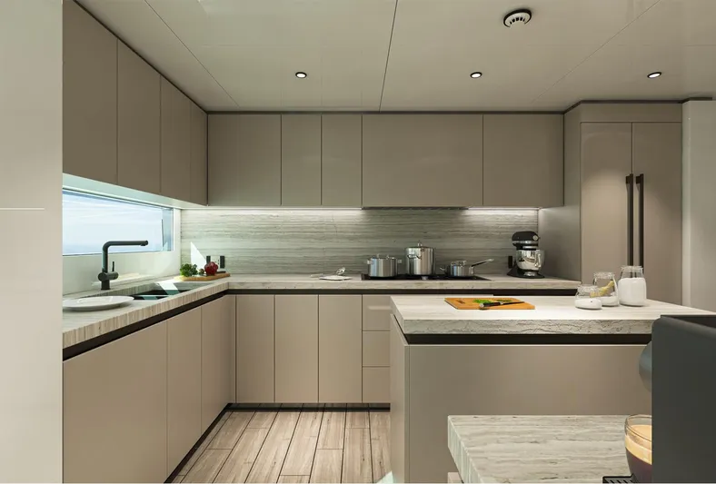 Aes Yacht Photos Pics Luxurious modern kitchen in 2026 AES Yacht 85, featuring sleek cabinetry and ambient lighting.