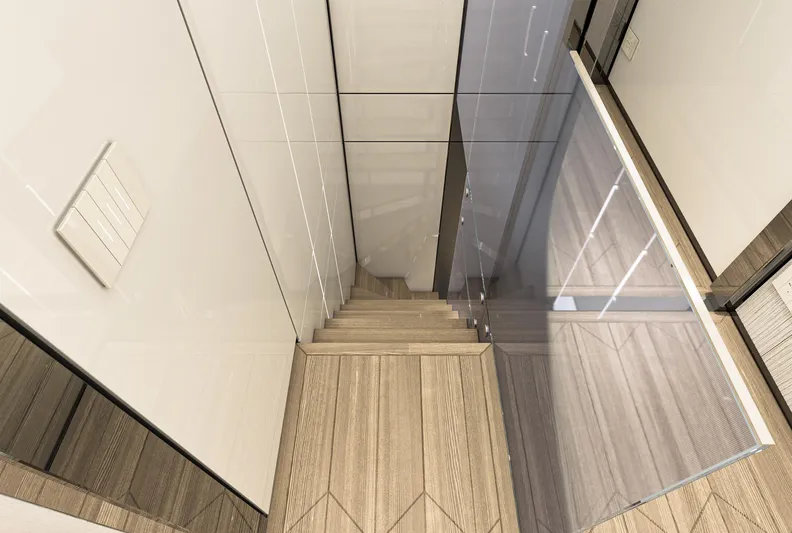 Aes Yacht Photos Pics Modern staircase with glass railing on AES Yacht 85, 2026 model.
