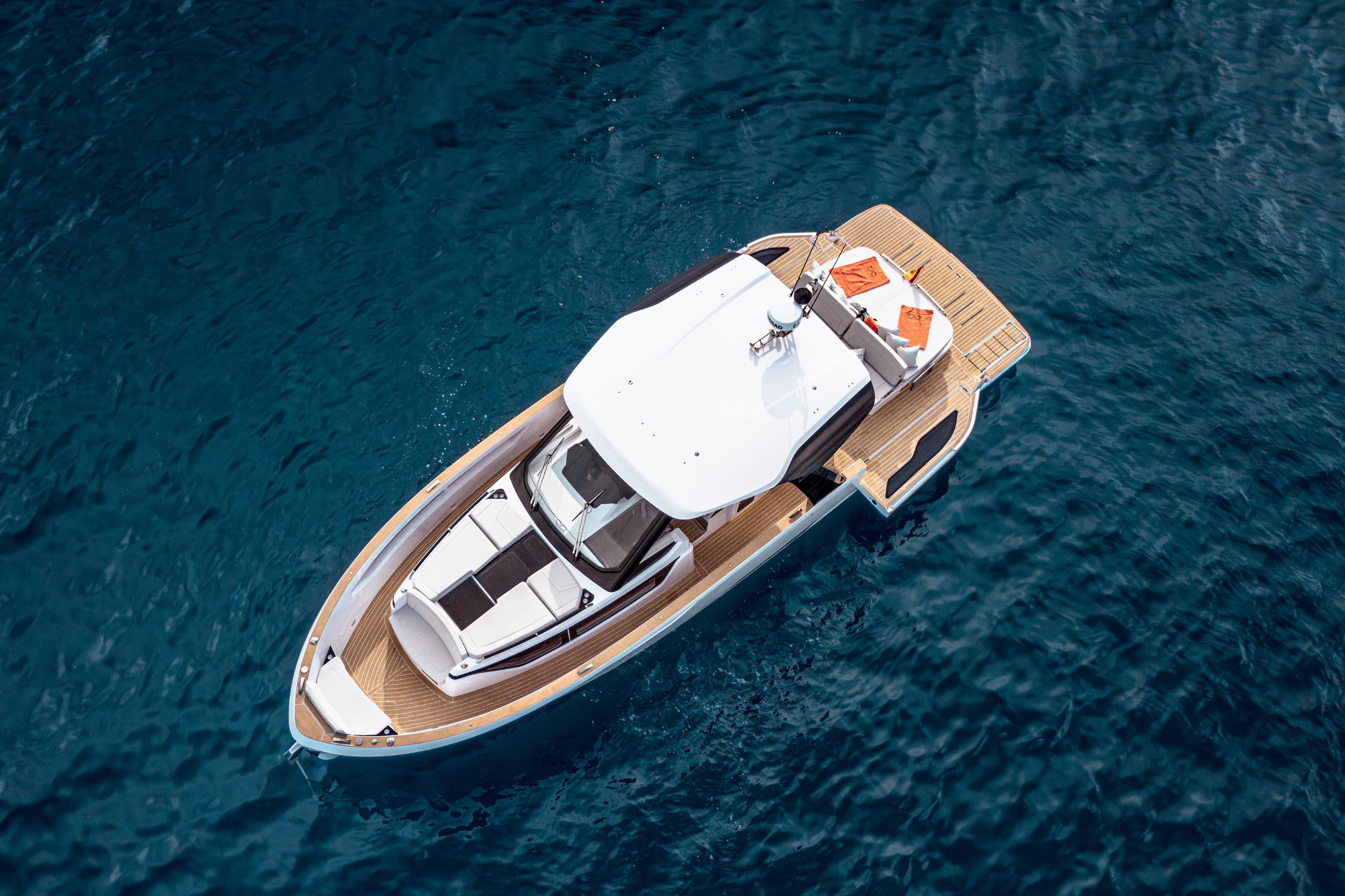 Aerial view of 2026 Level Yachts 43 ST on clear blue water.