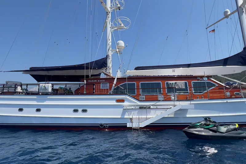  Yacht Photos Pics Custom-Craft Steel Pax Navi 43 m yacht, 2010 model, docked with jet ski nearby.