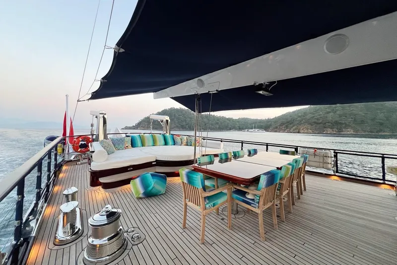  Yacht Photos Pics Luxurious deck of 2010 Custom-Craft Steel Pax Navi yacht with dining area and scenic view.