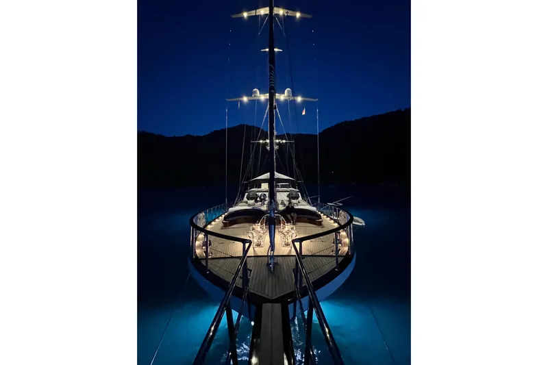  Yacht Photos Pics Luxurious Custom-Craft Steel Pax Navi yacht illuminated at night, 2010 model.