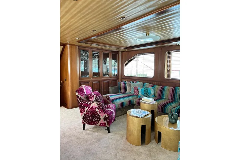  Yacht Photos Pics Luxurious yacht interior with vibrant seating, wooden cabinetry, and modern decor, Custom-Craft Steel Pax Navi 43 m, 2010.
