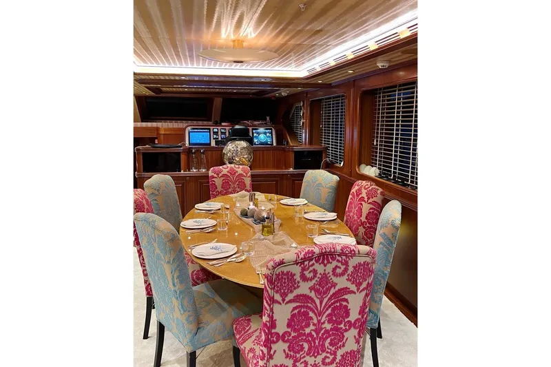  Yacht Photos Pics Luxurious dining area on 2010 Custom-Craft Steel Pax Navi yacht with elegant decor.