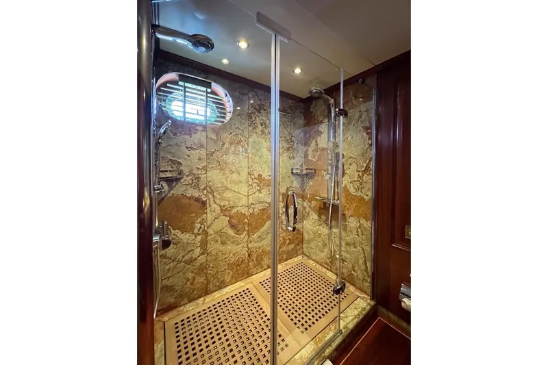  Yacht Photos Pics Luxurious marble shower in 2010 Custom-Craft Steel Pax Navi yacht.
