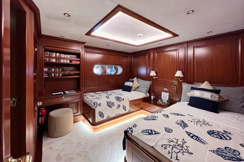  Yacht Photos Pics Luxurious yacht cabin with twin beds, wooden paneling, and nautical-themed decor, Custom-Craft Steel Pax Navi 43 m.