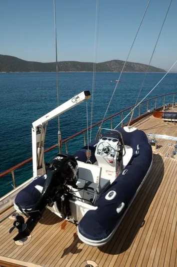  Yacht Photos Pics Custom-Craft Steel Pax Navi 43 m yacht deck with tender, 2010 model, scenic ocean view.