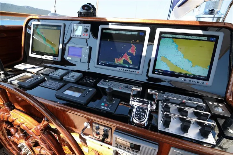  Yacht Photos Pics Control panel of 2010 Custom-Craft Steel Pax Navi 43 m yacht with navigation screens.