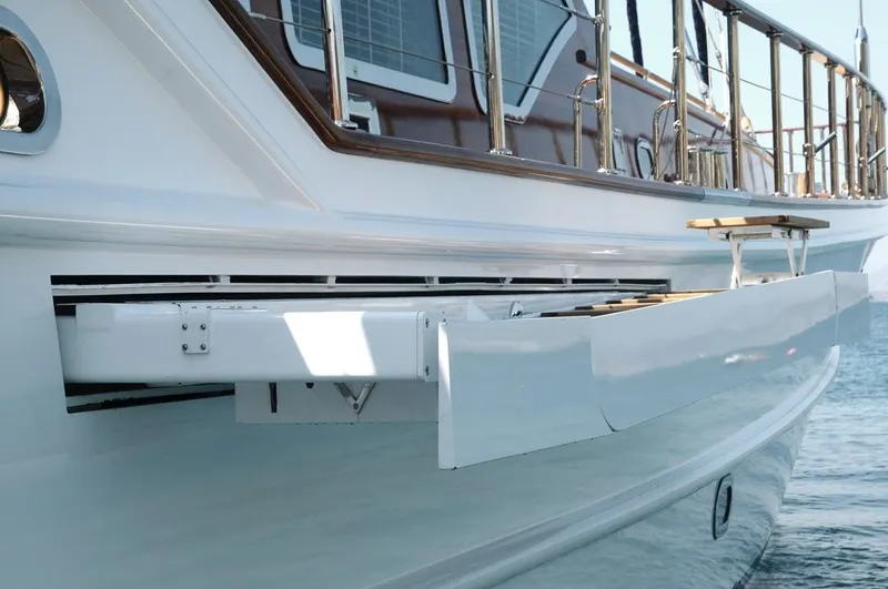  Yacht Photos Pics Custom-Craft Steel Pax Navi 43 m yacht, 2010 model, featuring a sleek side view with railing.