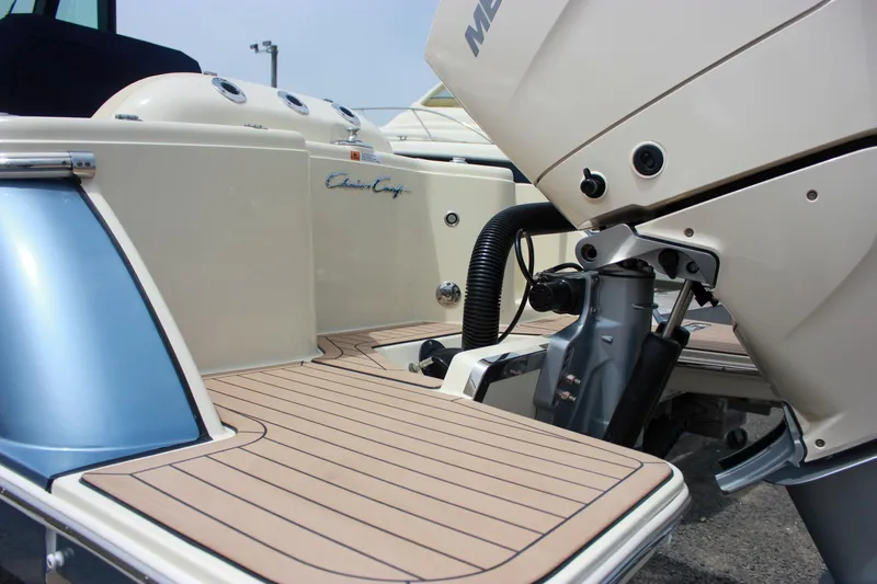 Yacht Photos Pics 2024 Chris-Craft Catalina 24 boat with outboard motor and teak deck.