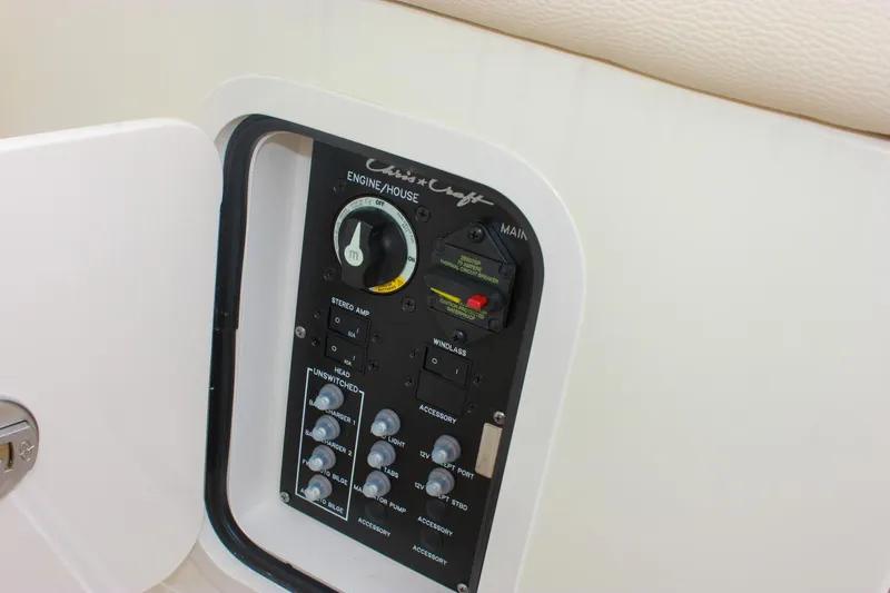  Yacht Photos Pics 2024 Chris-Craft Catalina 24 control panel with switches and gauges.