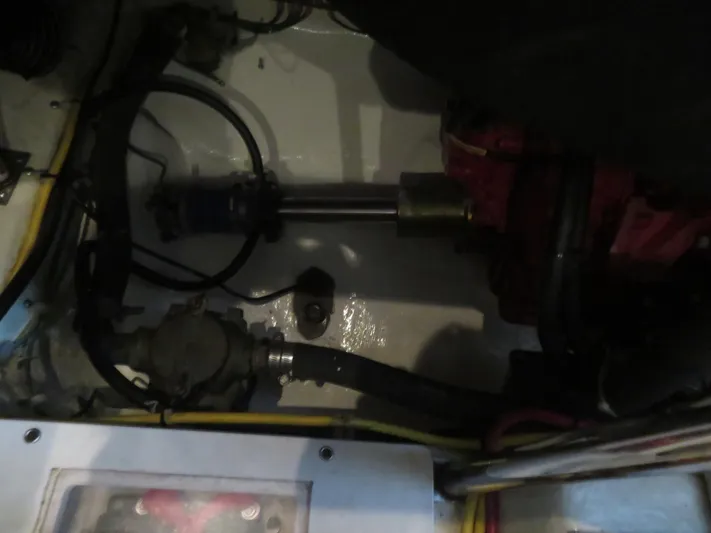  Yacht Photos Pics Engine compartment of 2004 Carver 420 Mariner boat, showing mechanical components and wiring.