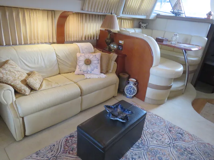  Yacht Photos Pics Luxurious interior of 2004 Carver 420 Mariner yacht with elegant seating and decor.