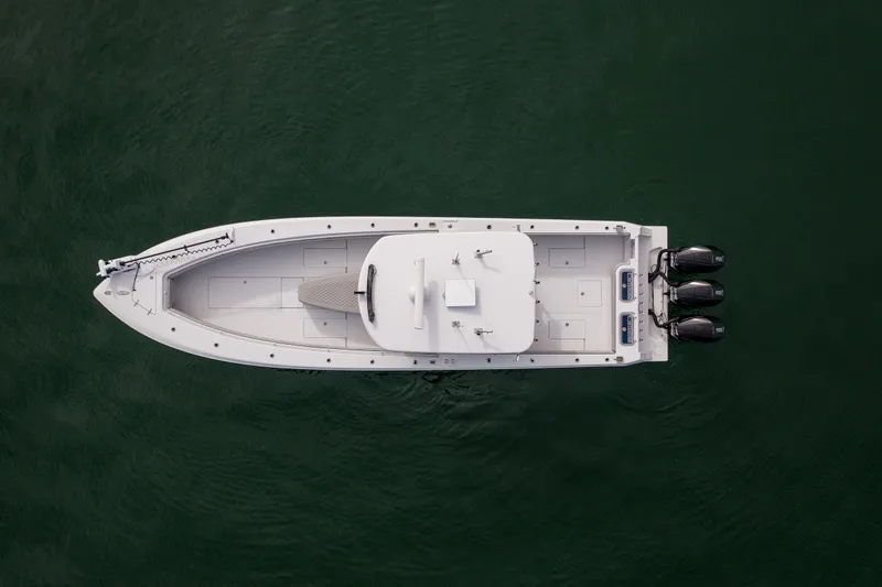  Yacht Photos Pics Overhead view of 2016 Contender 39 ST boat with triple outboard engines.