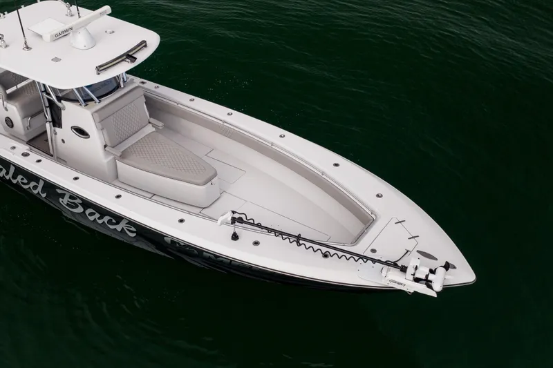  Yacht Photos Pics 2016 Contender 39 ST boat on water, aerial view, sleek design.